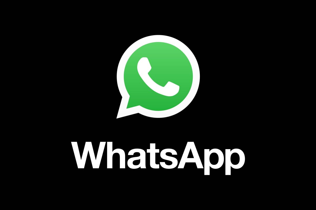 Das Logo von Whatsapp auf schwarzem Grund.
